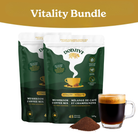 Two packages of Dodjiwi Mushroom Coffee Mix with a glass of coffee on a white background.